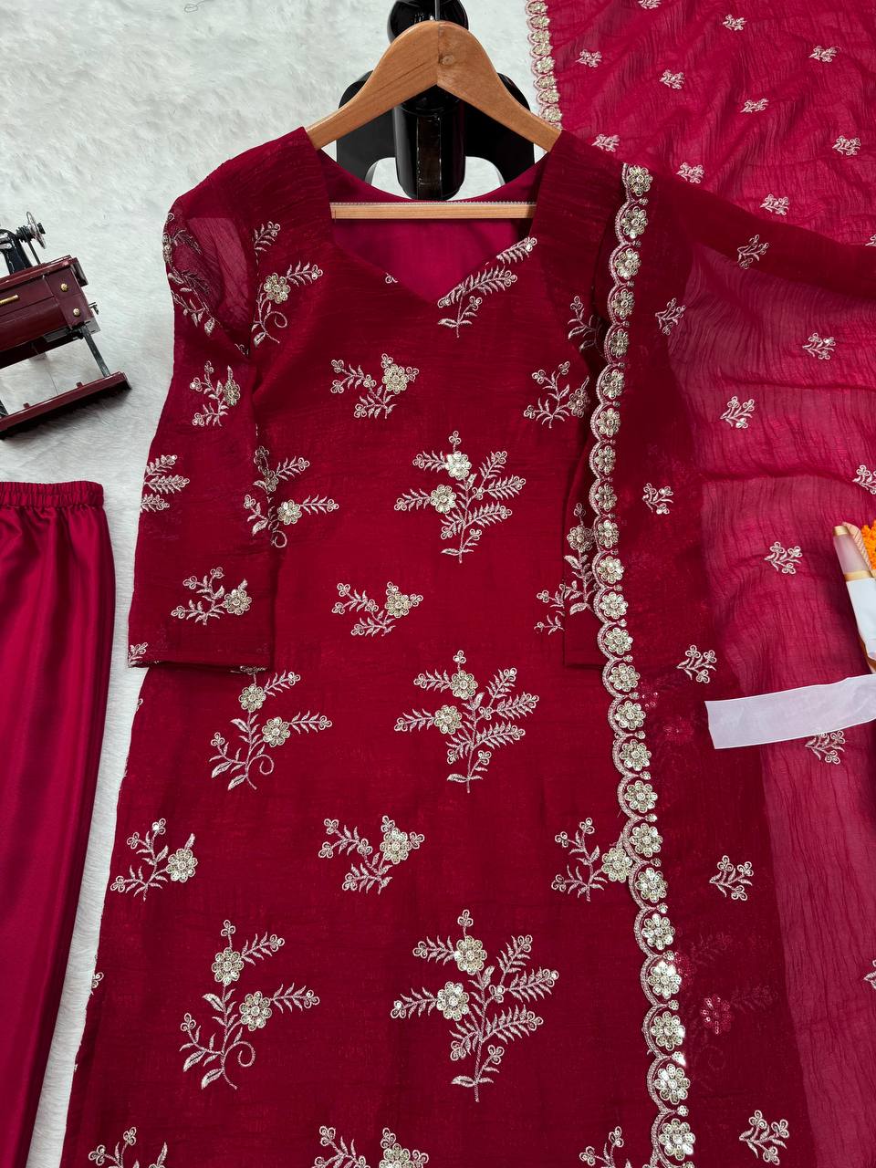 Exquisite three-piece ensemble featuring a crunchy silk Top dupatta and cotton pent