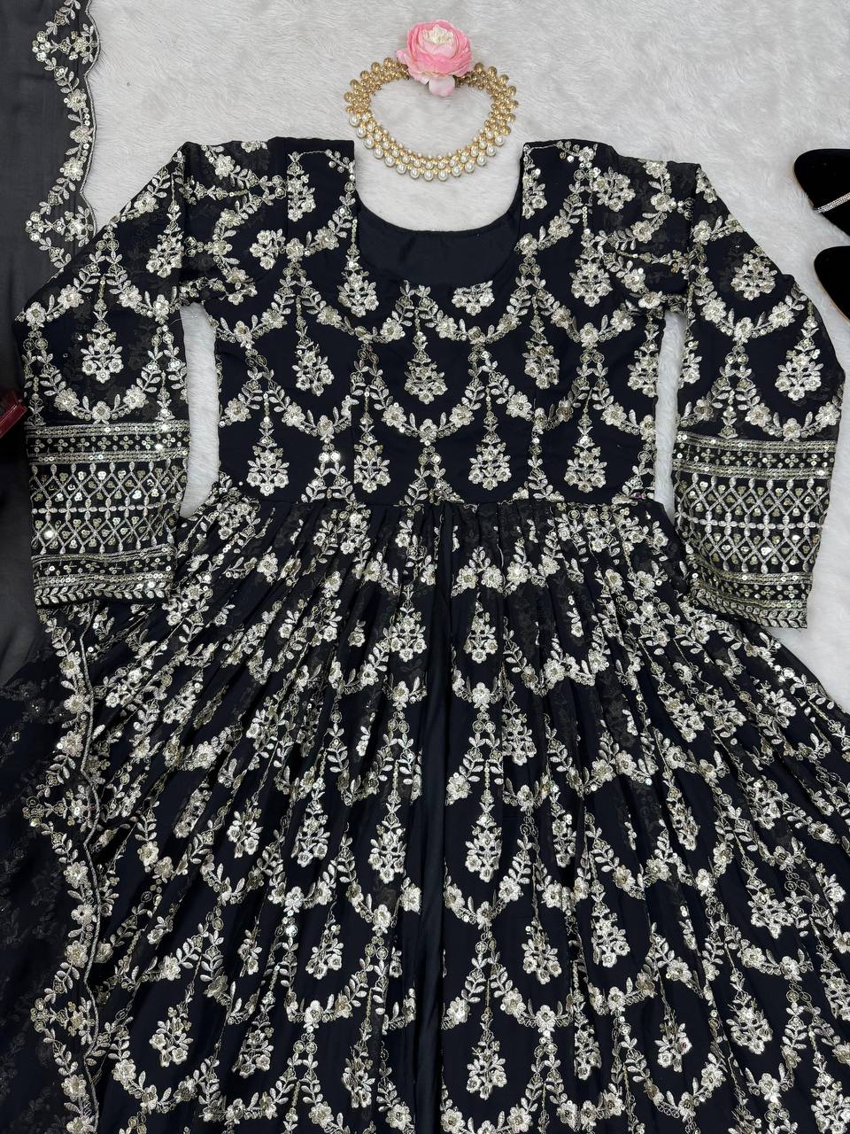 Three-piece ensemble featuring a faux georgette top pent with dupatta